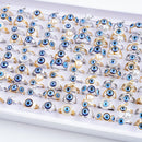 Engagement rings, rings, men's wedding bands, wedding rings, promise rings, diamond earrings, engagement rings for women, diamond ring, earrings, wedding bands, Cartier ring, lab-grown diamond rings, men's rings, pearl earrings, gold hoop earrings, gold earrings, earrings for women, lab-created diamond rings, Pandora rings, lab-grown diamond engagement rings, emerald ring, diamond rings for women, gold rings, 