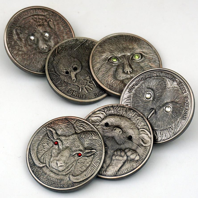 animal coin, silver snake, cat with coins, coin animals, coin elephant, coin spider, coin with deer on it, cat coins, coin with cow, coin with elephant, evangelion coin, gold coin with panda bear, gorilla coin,